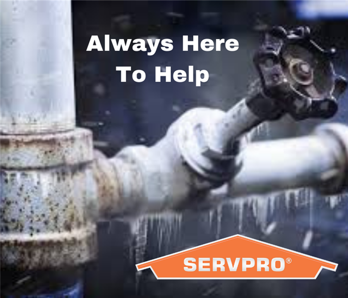 This picture shows a water pipe with the SERVPRO logo, and the words, Always Here To Help. 